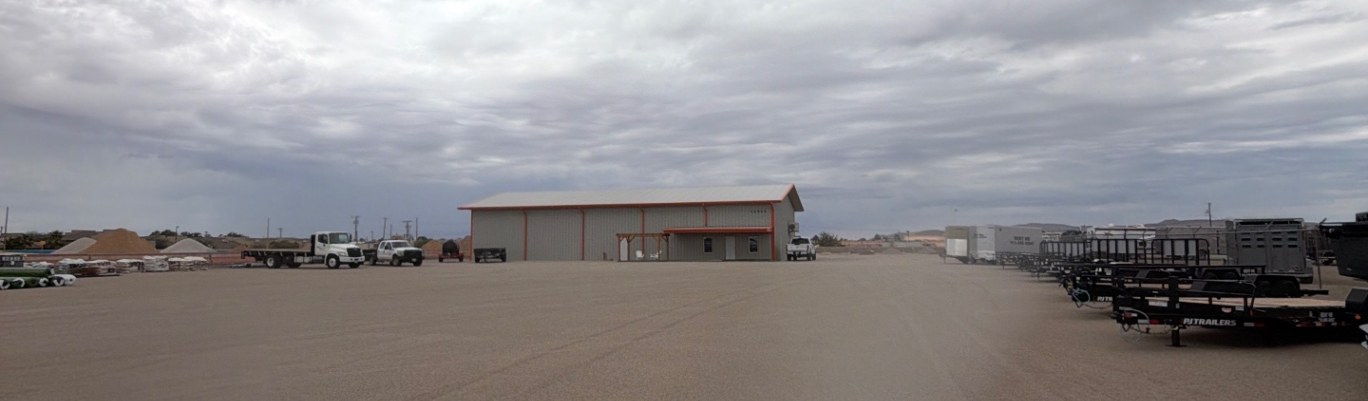 The EquipScape yard at 14941 Montana Avenue in El Paso, with the rental building and a row of trailers