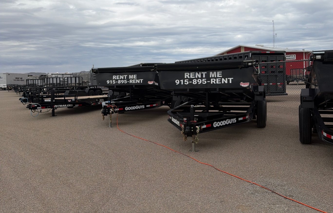 Row of EquipScape dump and utility trailers lined up and ready to rent at the Montana Avenue yard in El Paso