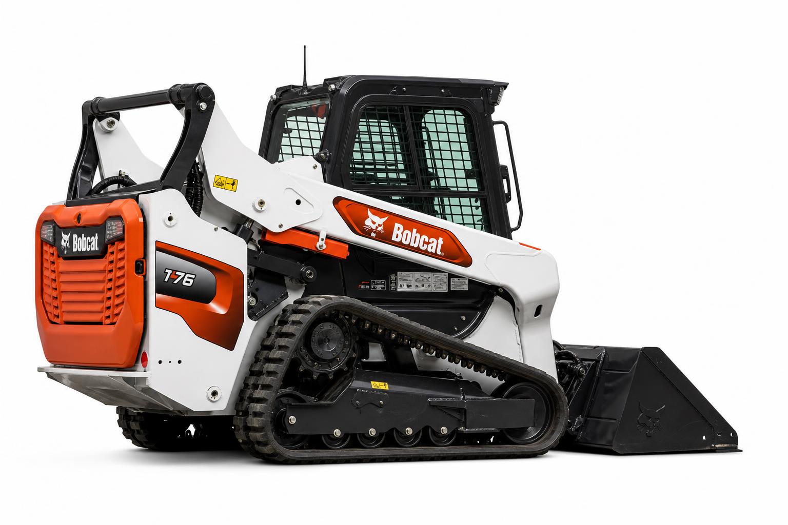 Bobcat skid steer moving fill dirt on a residential landscape job in El Paso